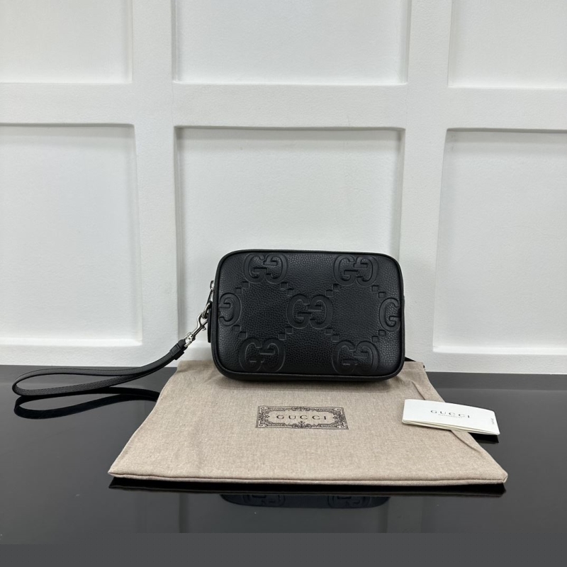 G*u*i clutch bags